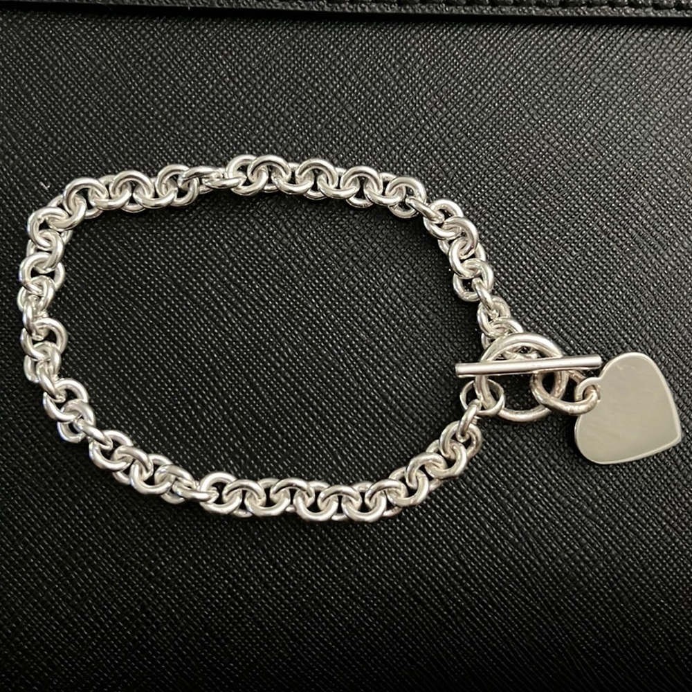 Silver chain bracelet with heart charm